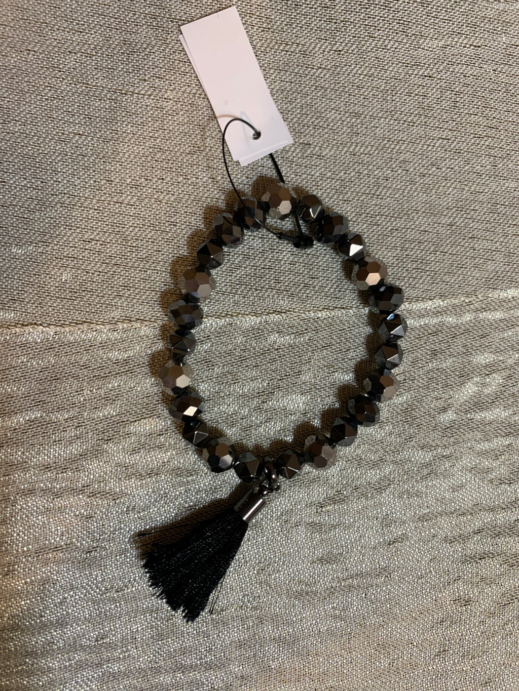 Black Faceted Crystal Stretch Bracelet with Tassel Charm