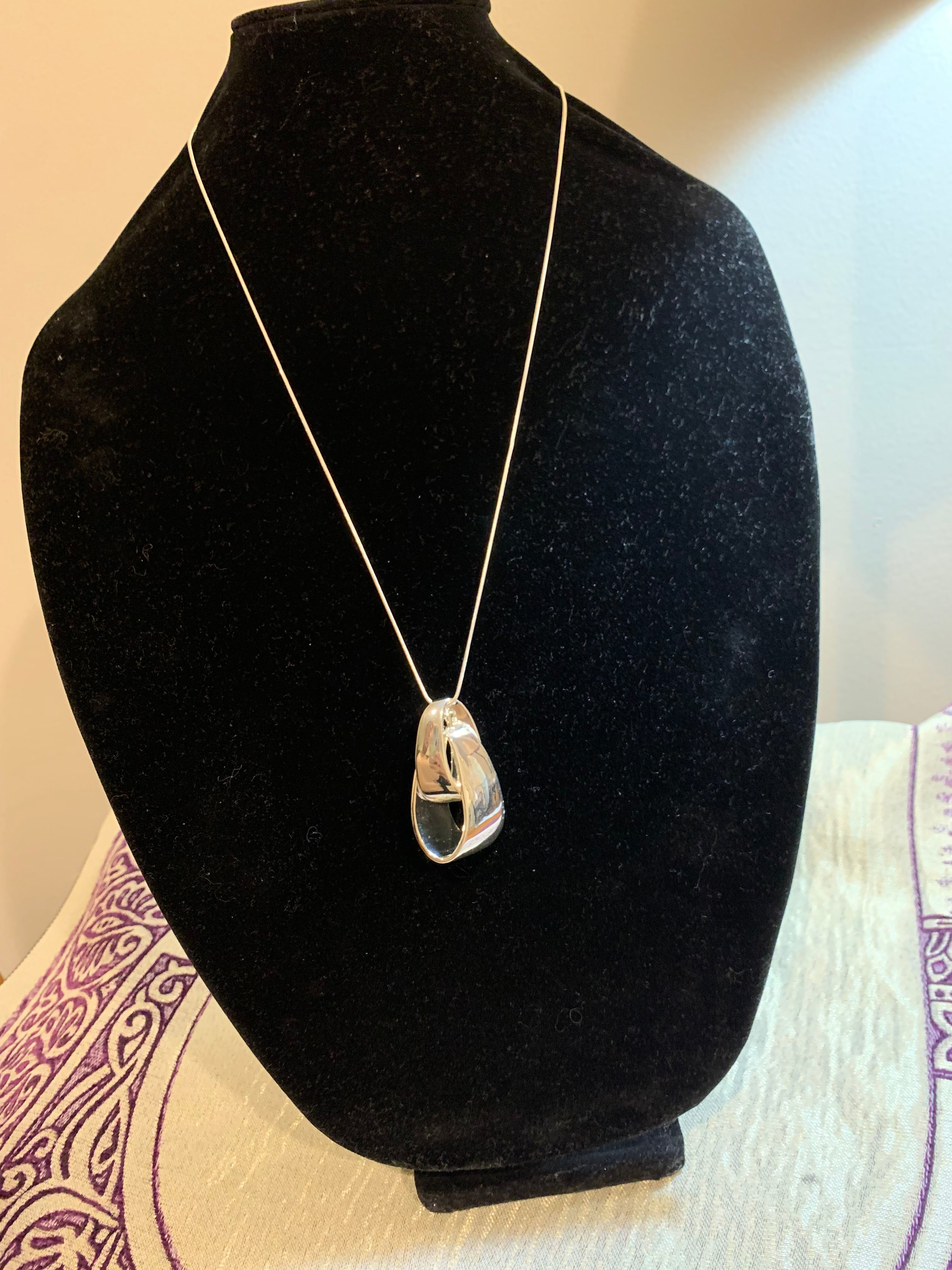 Polished Silver Sculptural Twisted Pendant Necklace