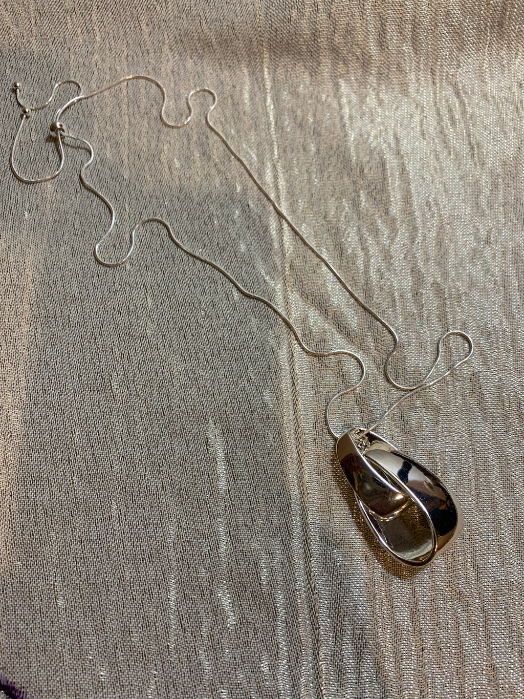 Polished Silver Sculptural Twisted Pendant Necklace