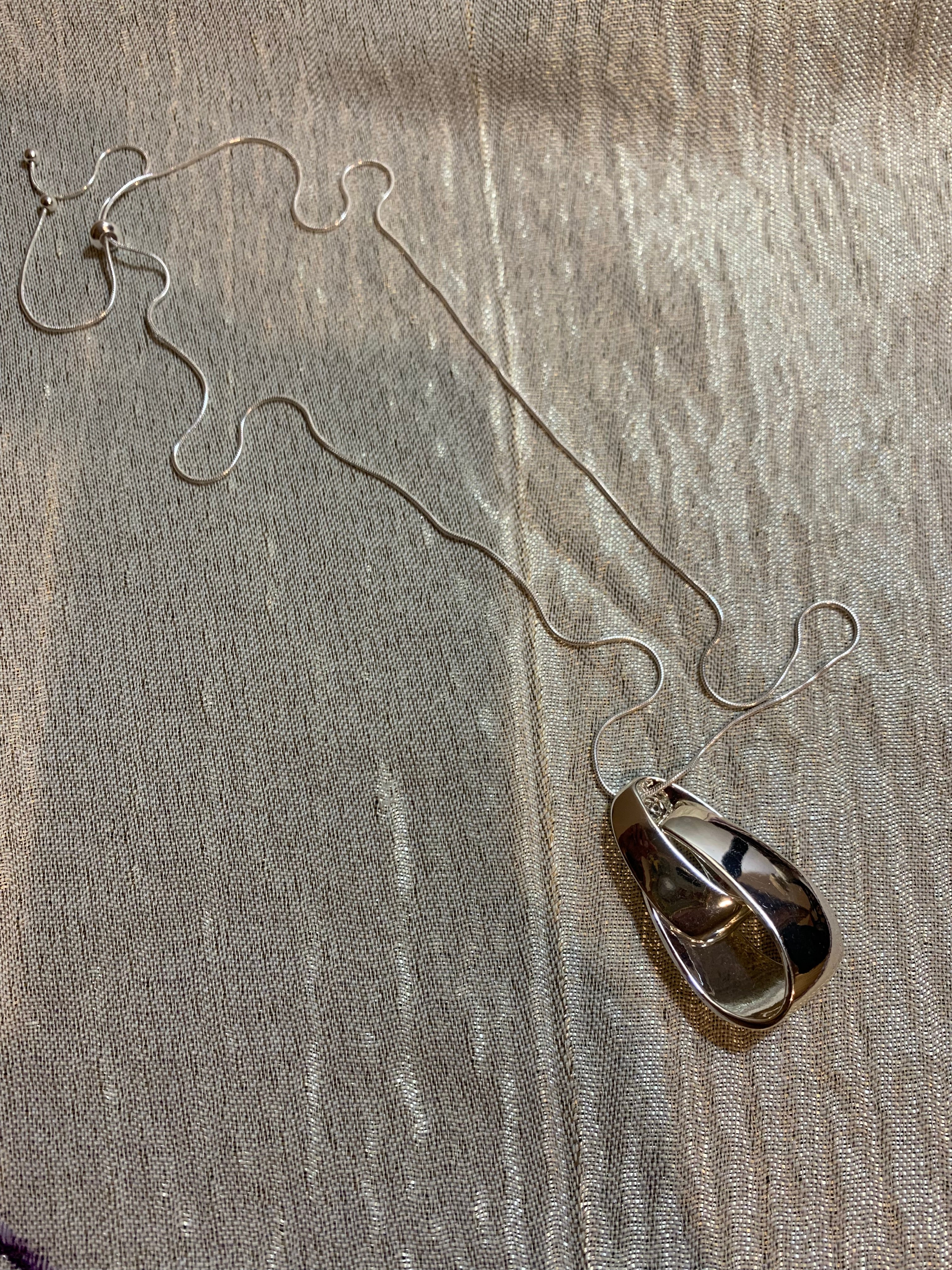 Polished Silver Sculptural Twisted Pendant Necklace